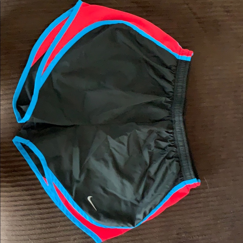 Nike shorts.  Size small.  Black, pink, and blue.